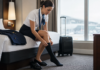 Best Compression Socks for Flight Attendants: What Actually Helps on Long Duty Days Flight attendant putting on compression socks before a long duty day