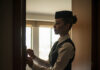 Hotel Safety Tips for Cabin Crew: What Your Layover Checklist Should Include Flight attendant checking hotel room door lock - hotel safety tips for cabin crew
